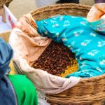 Kenke Masaale: Boiled, mixed and seasoned wheat grains and beans usually sold outside shrines.