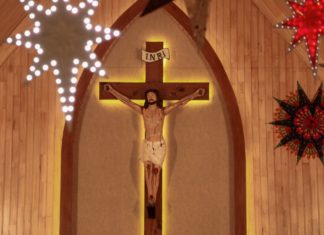 Christmas Special Christian Cross: Representation of the crucifixion of Jesus on large wooden cross.