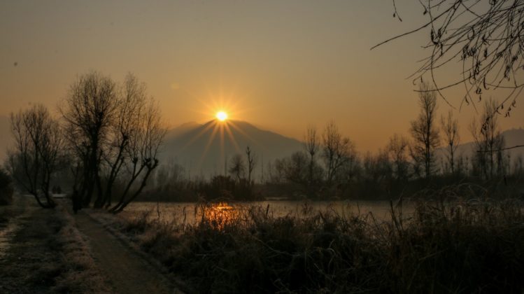 The famous floating market of Kashmir witnessing frosty sunrise.