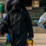 Female devotee coming out of Khanqah-E-Maula.