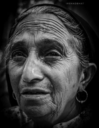 On 10th of Ashurah, I went to Hassanabad to capture Muharram processions. It was very tough for me to click as everyone was crying in remembrance of Hazrat Imam Hussain (A.S.) keeping control on my emotions I saw this old lady crying and I ended up clicking her picture.